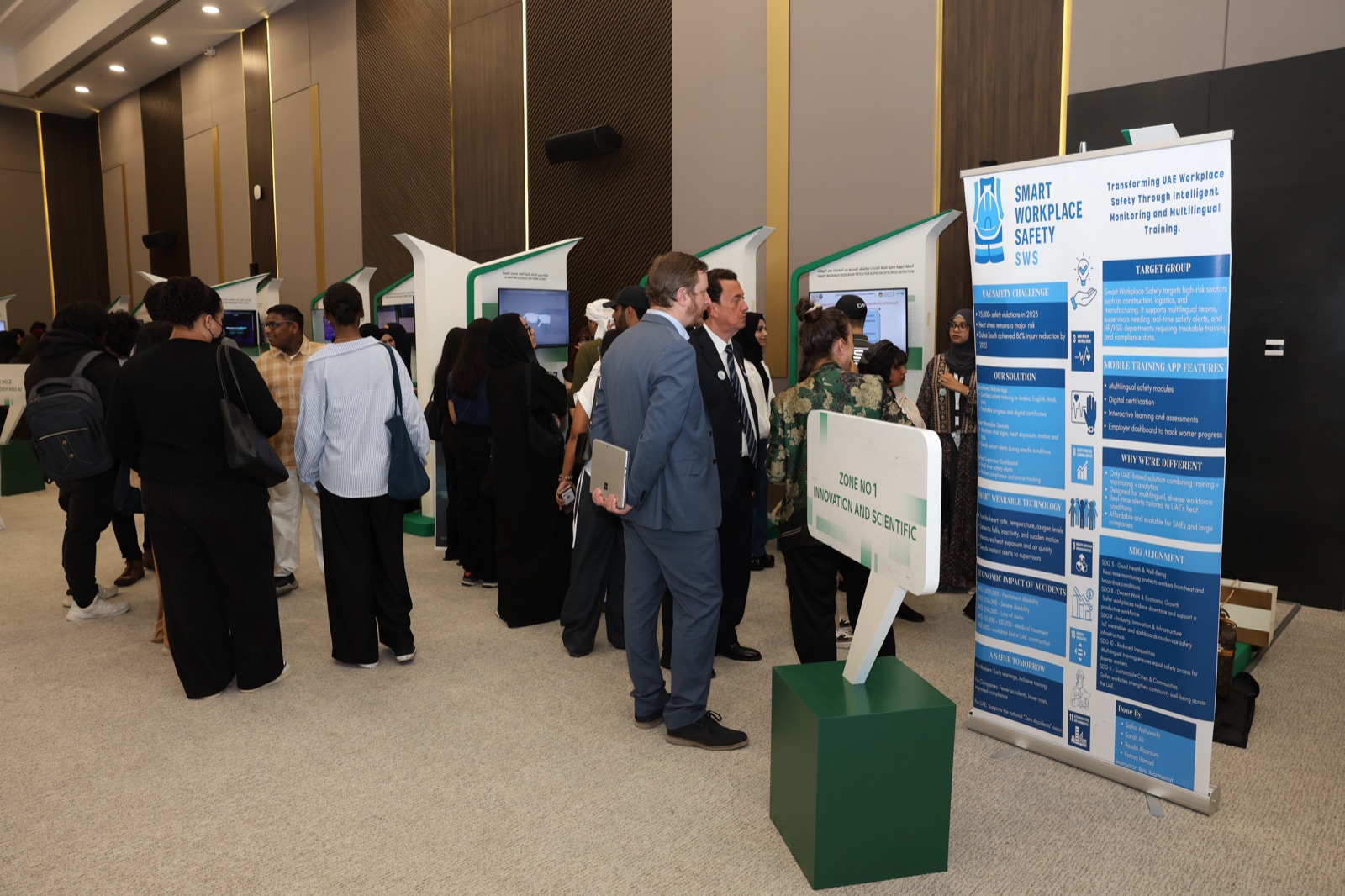 Visitors viewing student project posters at a previous Forensic Science Forum